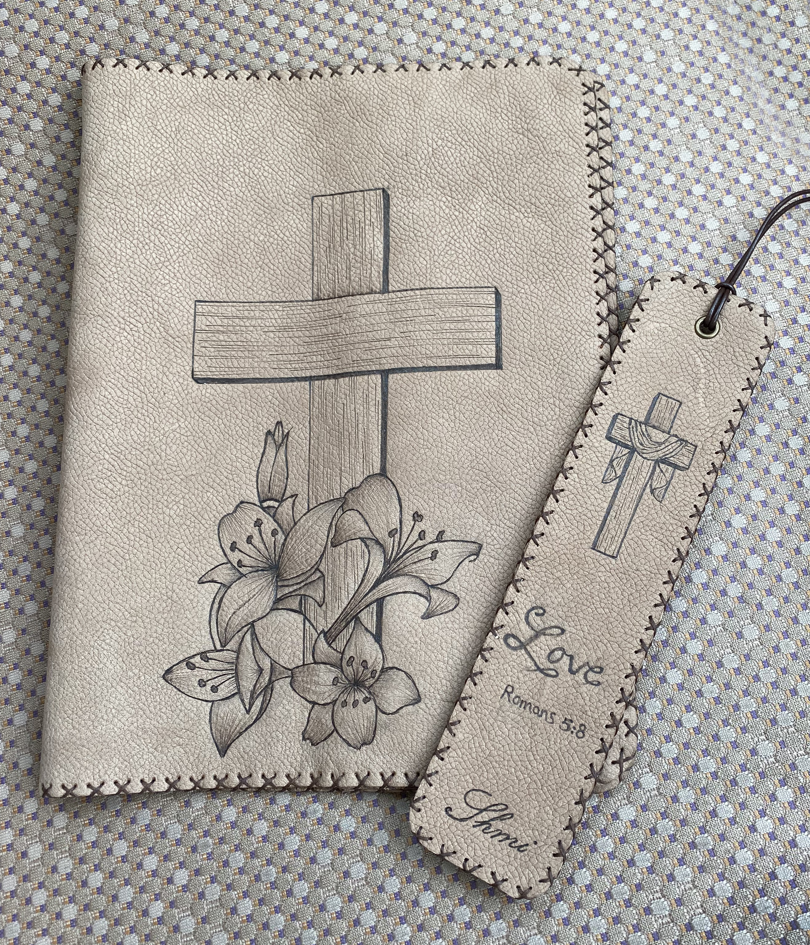 Burned with a hot pen on leather